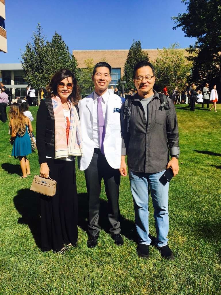 Dr. Mark Wang at his white coat ceremony with his supportive family