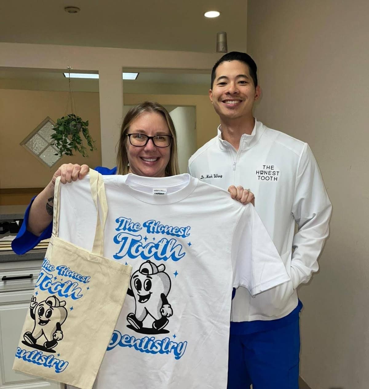 A warm multi-generational family group smiling at The Honest Tooth Dentistry, representing our commitment to comprehensive family care