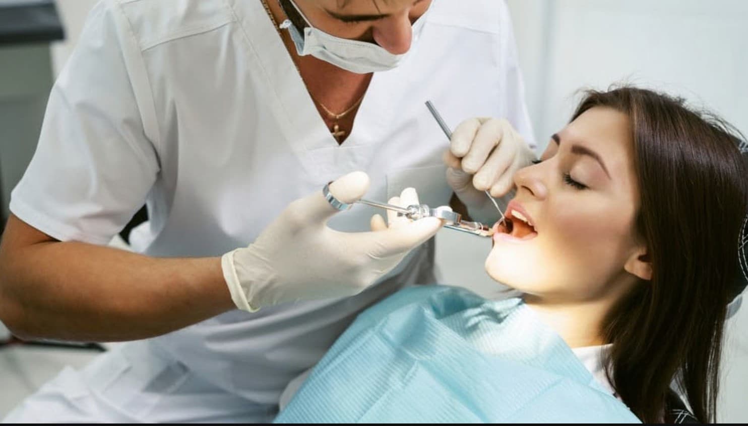 Dentist carefully administering Botox treatment to a patient